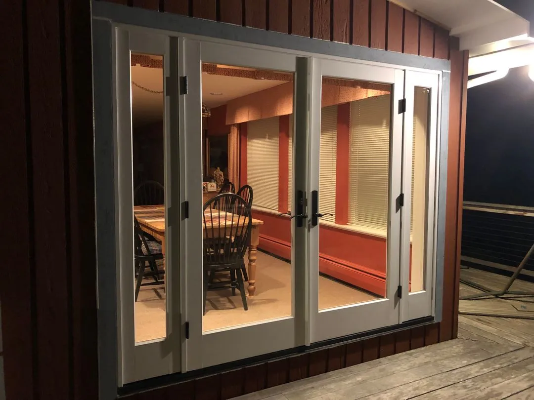 French style glass sliding doors in Scottsdale AZ on a cozy night